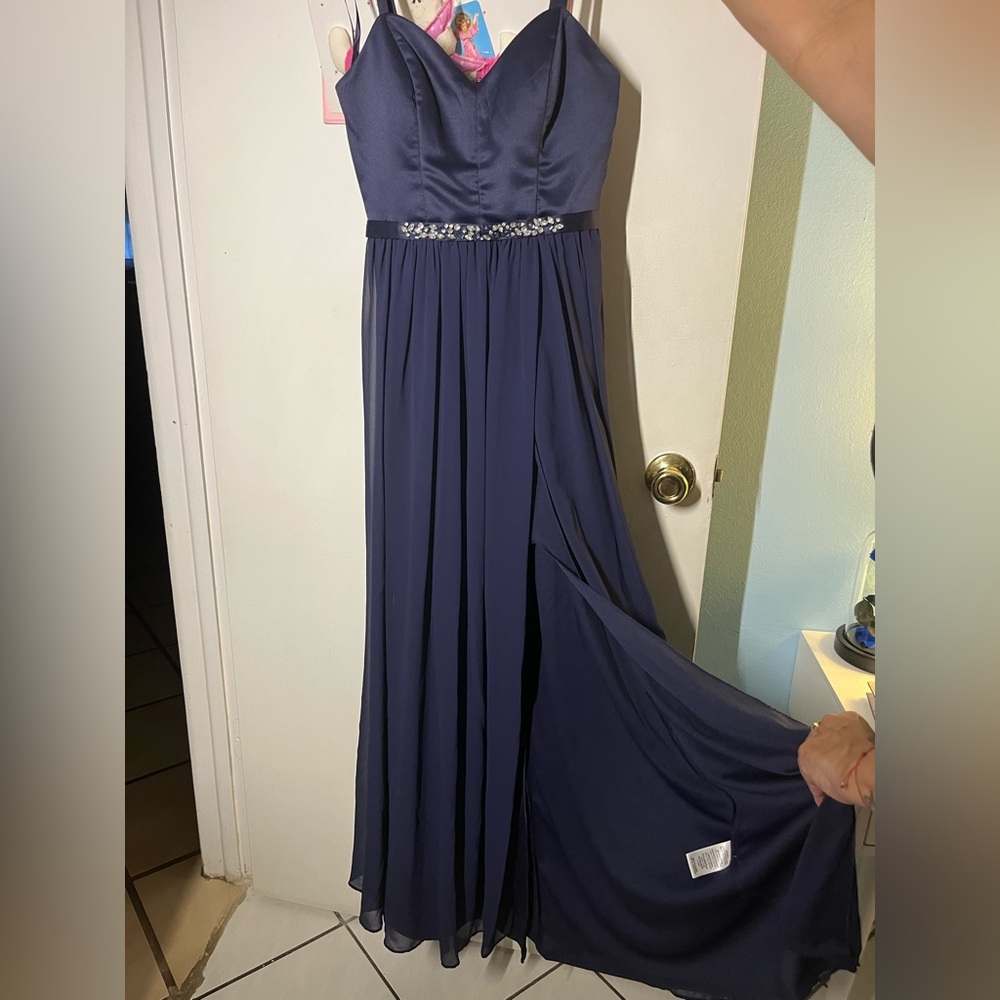 This dress is from City Studio and it is a size 0 in juniors.
